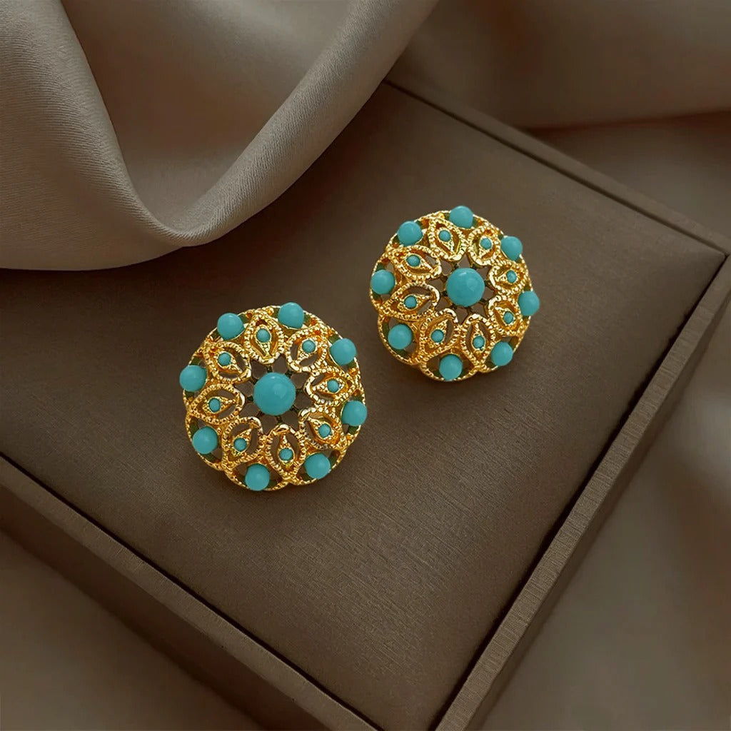 Vintage geometric turquoise earrings on display box