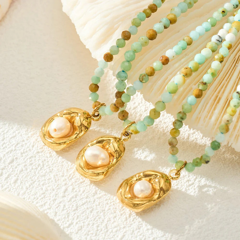 Multiple natural stone bead necklaces with pearl pendants